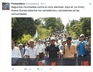 Figure 3: The tweet reads: We continue to mobilize against the electoral circus. In La Unión, Nueva Guinea, the campesinos and campesinas from the communities are here. 